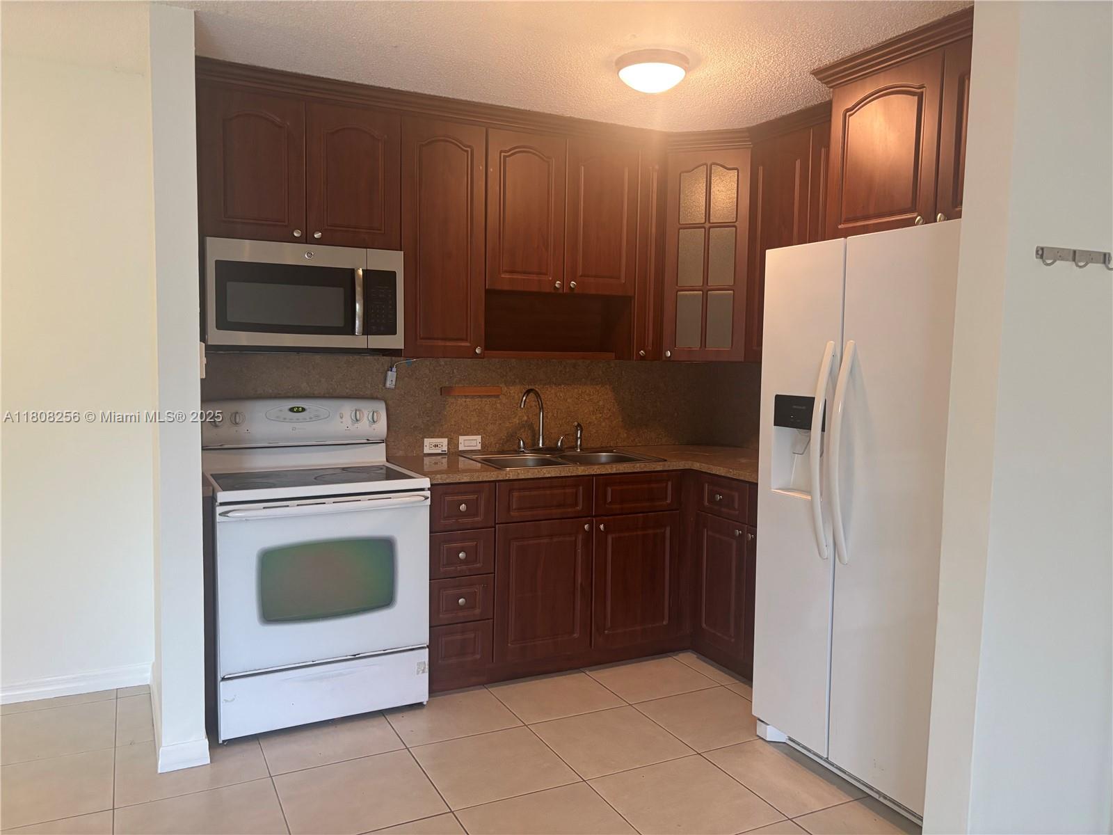 Welcome to an inviting 2-bedroom, 2-bath condo in the heart of North Miami Beach. This comfortable 870-square-foot home is perfect for anyone looking to enjoy convenience, functionality, and great nearby amenities. Unit has a patio and washer/dryer. Whether you're a first-time buyer or looking to downsize, this home checks the boxes for smart, easy living. This property can also be a great investment opportunity with low maintenance fees and regular rental demand. This Bldg allows unit to be rented immediately (unlike some other Bldgs in the community).
This gated condo community has a pool and assigned parking plus many guest parking spots.
The location is central and close to shopping on Biscayne Blvd and Aventura Mall. Convenient access to public transit.