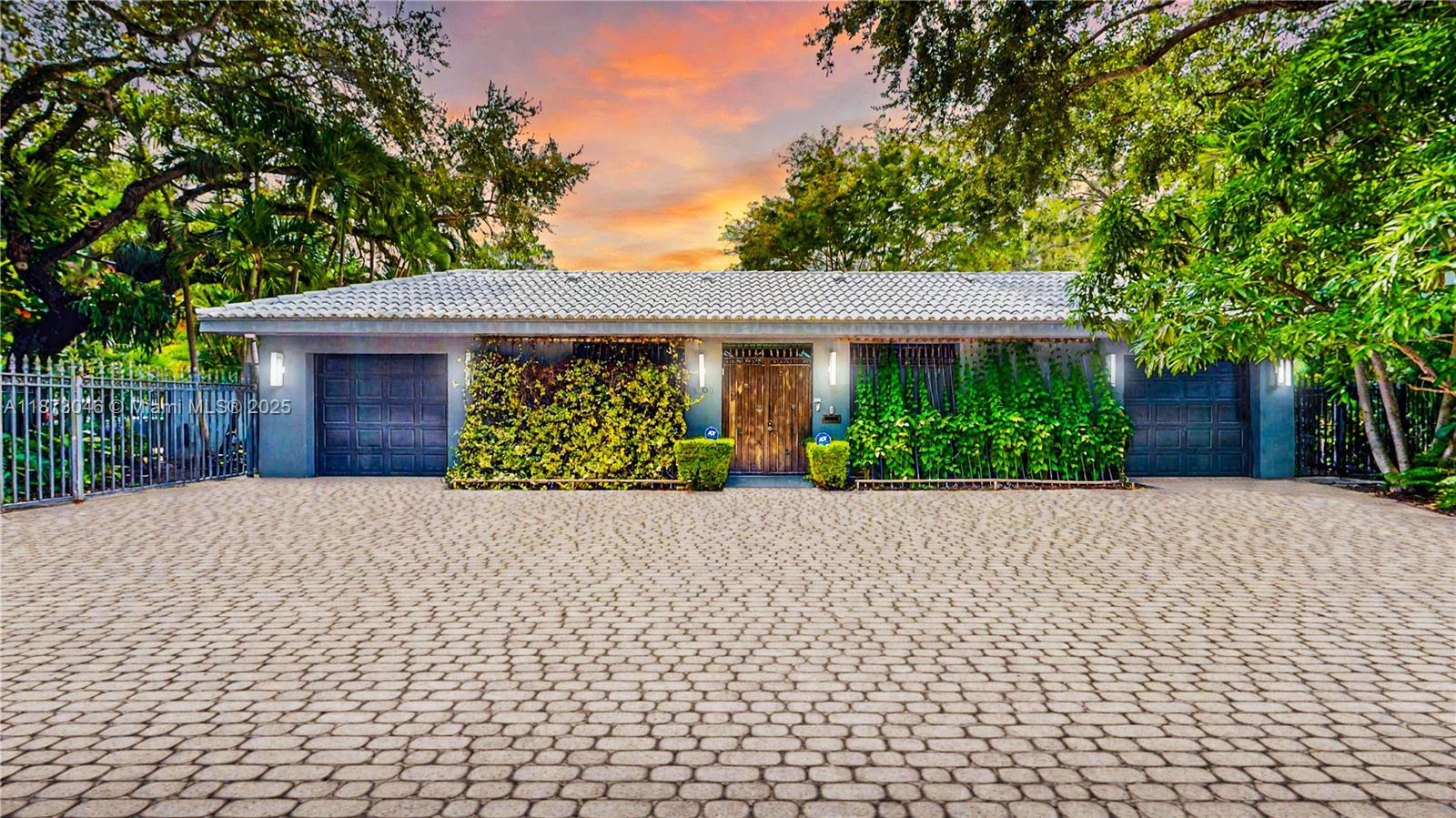 Welcome to your private sanctuary in North Grove, a distinctive 4-bedroom, 4.5-bath residence on a lush 10,000+ SF corner lot. A curated courtyard with pool and patio creates a tranquil Zen centerpiece visible from most rooms. The layout opens with a foyer leading to a spacious living area, office/library, and a guest suite. The dining room flows into a chef’s kitchen with top-tier appliances. The master retreat features dual baths and custom closets. Gallery-style walls and museum lighting are perfect for art, while whimsical touches add charm. Includes impact glass, walled grounds, and security for privacy and peace of mind. This exceptional home blends style, function, and serenity in one of Miami’s most coveted neighborhoods. Enjoy the 3D tour. May the Force be with you.