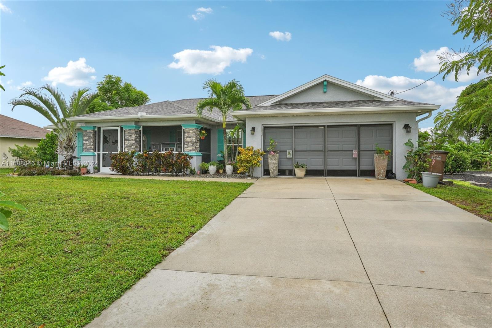 Move in ready 3/2/2 pool home in desirable area of NW Cape Coral. Double Lot perfect for subdivide or at home business. The interior of the home features tiles throughout, a split floor plan, volume ceilings and neutral decor. The kitchen has bight white cabinetry, granite countertops, stainless steel appliances and a large 2-tiered breakfast bar. Step outside to a backyard oasis and relax by your resort style heated pool and spa with an outdoor kitchen already in place. Rood replaced in 2020, AC 2016, impact windows in 2022 and so much more. Again, Double Lot with an Office ONSITE!