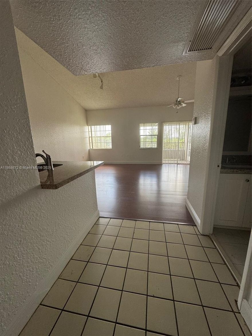 Welcome to this charming 3RD-floor condo, featuring 2 bedrooms, 2 bathrooms, and the convenience of an in-unit washer/dryer. Located right next to the main clubhouse, gym, and pool, Nestled in a vibrant community with resort-style amenities, this property is perfect for both investors and homeowners looking for comfort and convenience. Enjoy a wealth of amenities, including 3 pools, 2 hot tubs (accessible dawn to dusk), a state-of-the-art gym, a billiards room, a car care center, 4 EV charging stations, tennis and racquetball courts, and nightly security. This community is highly investor-friendly, leasing options allowing for a minimum of 6 months, twice per year, and a 620 credit score required for tenants. Located close to the Turnpike and a variety of shopping destinations.