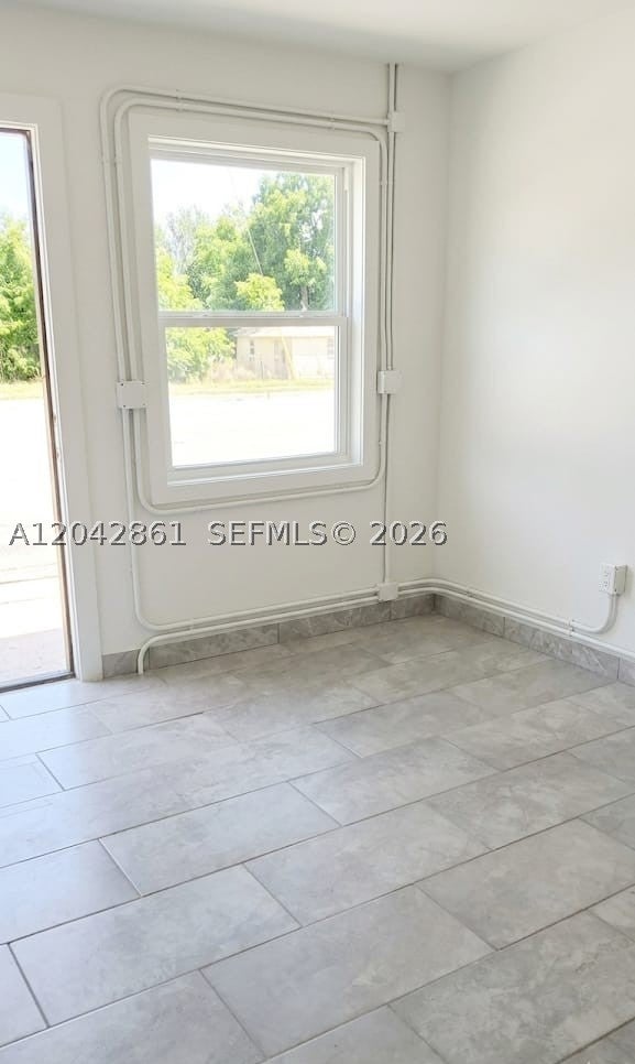 Photo of 240 SW 6th St #1, Belle Glade, FL 33430 (MLS # A12042861)