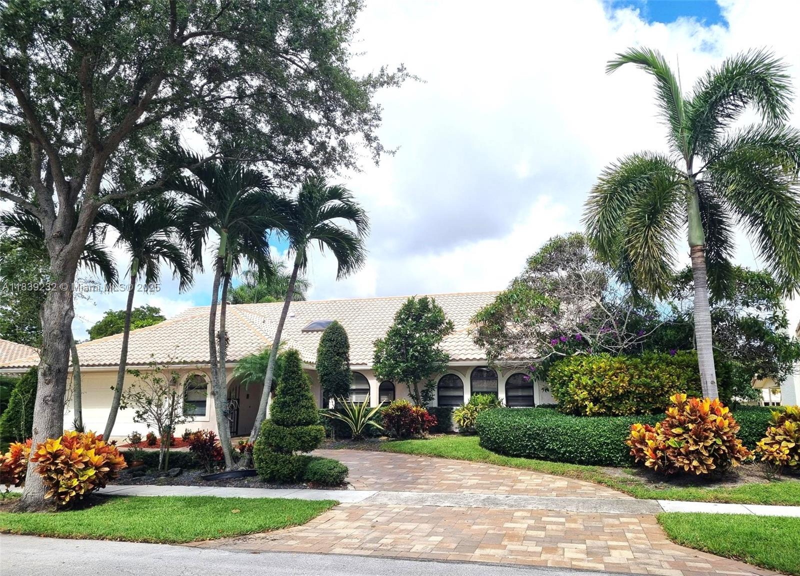 RENOVATED LAKE-FRONT ONE-Story HOME IN CENTRAL BOCA WITH VAULTED CEILINGS, WITH FRENCH PATTERN TRAVERTINE DECK, UPDATED KITCHEN WITH TAJ MAHAL COUNTERTOP OVERLOOKING FAMILY ROOM, FIREPLACE, AND BREAKFAST AREA WITH THE VIEW OF THE POOL AND THE LAKE. NEW BATHROOMS, IMPACT WINDOWS AND SLIDING DOORS, PLANTATION SHUTTERS, AUTOMATIC SPRINKLERS, AND BEAUTIFUL TRAVERTINE FLOORS. LOCATED IN THE DESIRABLE NEW FLORESTA COMMUNITY. CLOSE TO TOWN CENTER MALL, SHOPPING, RESTAURANTS, GREAT PUBLIC AND PRIVATE SCHOOLS.
