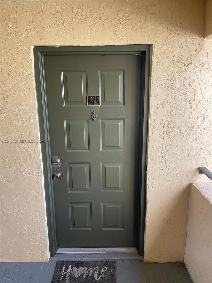Discover 9999 Summerbreeze #212, a spacious unit in Sunrise, FL 33322. This home features a washer and dryer, and a large open balcony. With wood laminate flooring throughout, this unit offers a cozy and elegant ambiance. SELLER REALLY MOTIVATED.