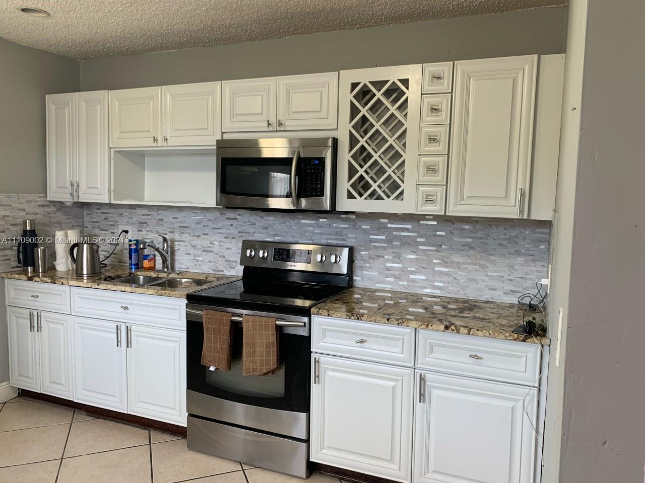 CORAL WAY PARK SEC C - Residential Lease