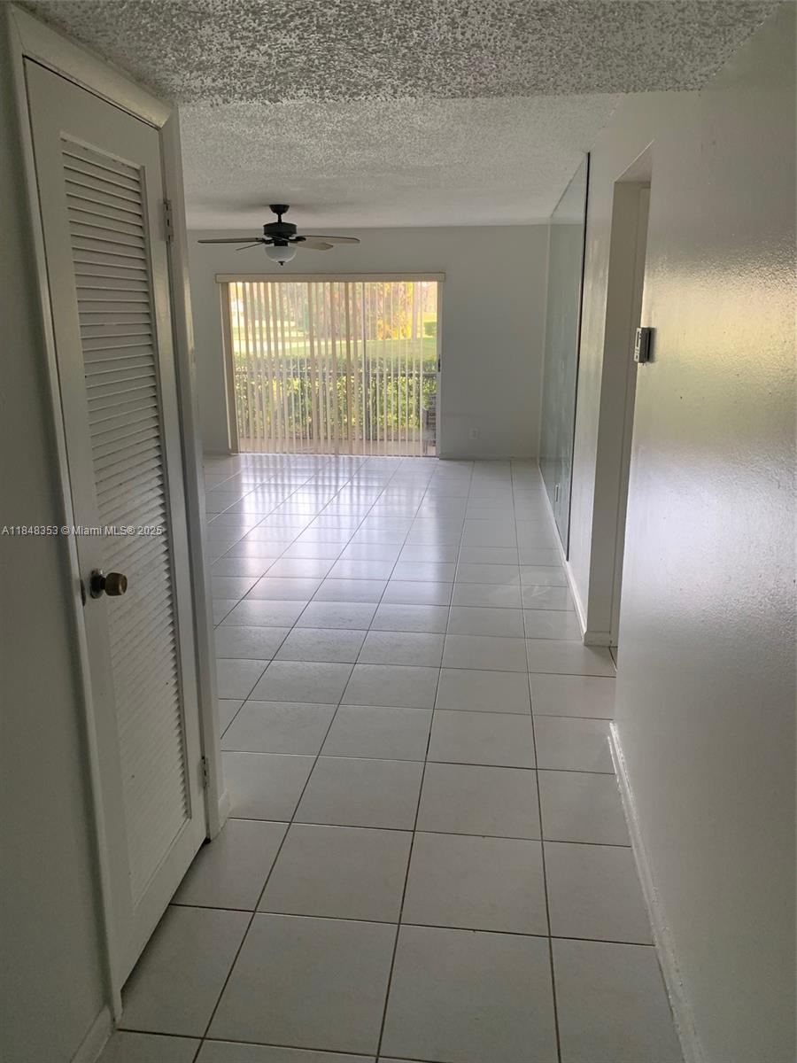 Nestled in a serene enclave a spacious ground floor1/1 living area enhanced by natural light and a tranquil garden view creates your dream home. The bedroom is generously sized and has a walk-in closet. Located in a beautiful community with 24/7 security guard, a swimming pool, and a green space with lush landscaping for relaxing walks. A convenient shared laundry room on each level sits diagonally from the unit. HOA includes water, cable, TV and internet service. Plenty of stores and restaurants outside the community offering many types of cuisine. Call listing agent to arrange a showing.