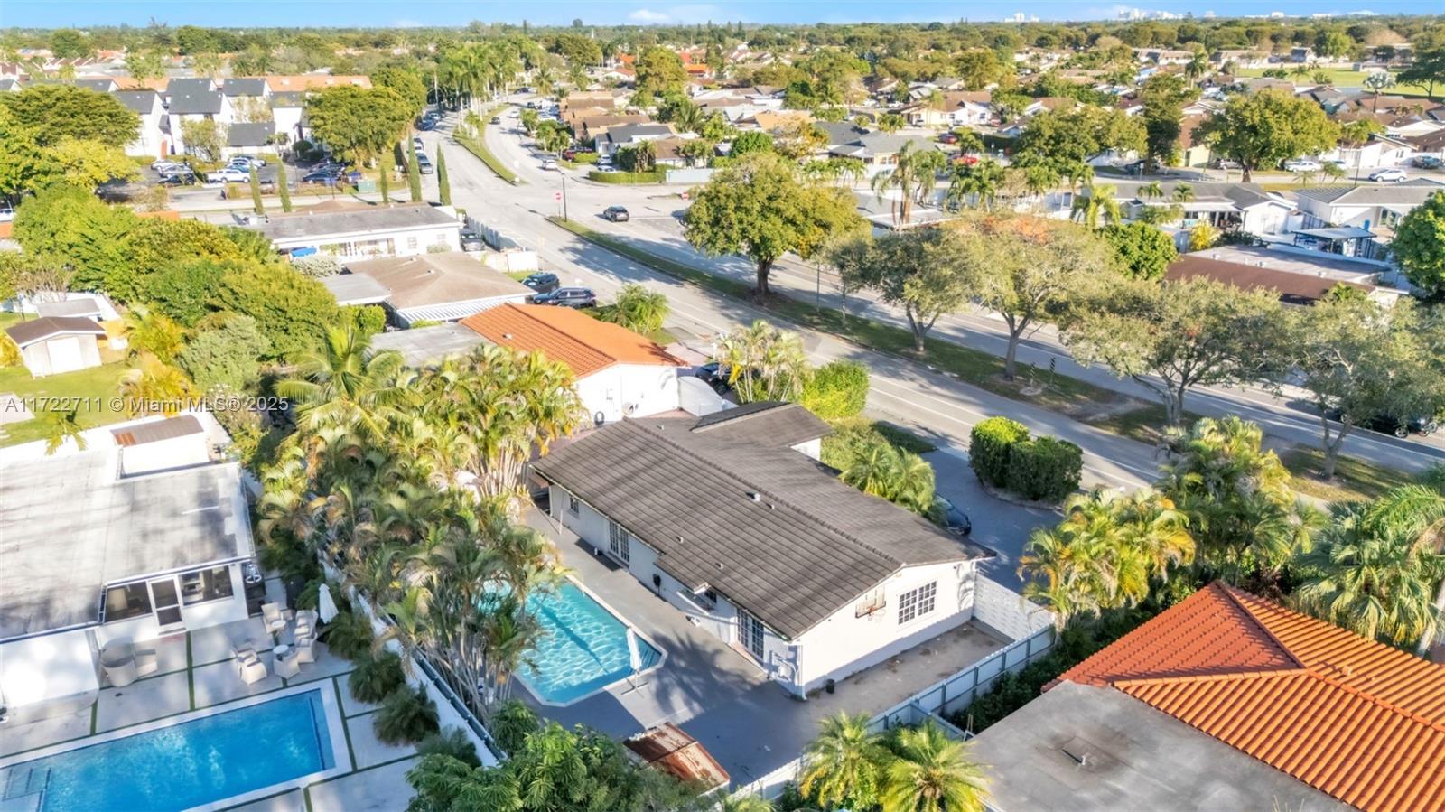 For rent in Miami! Discover this stunning 4-bedroom, 2.5-bath home in the heart of Kendale Lakes. Perfect for entertaining, it features a spacious living room, family room, dining area, and a versatile den. The modern kitchen, complete with sleek appliances, is a chef’s dream. Tile floors and abundant natural light create a warm, inviting ambiance throughout. Outside, a fenced yard with a sparkling pool awaits your gatherings and relaxation. With ample storage and a massive driveway accommodating up to 10 vehicles, space is never an issue. Ideally located near McMillan Park, top-rated schools, and shopping, this maintained community offers both comfort and convenience. Your perfect Miami retreat is ready—don’t miss out!