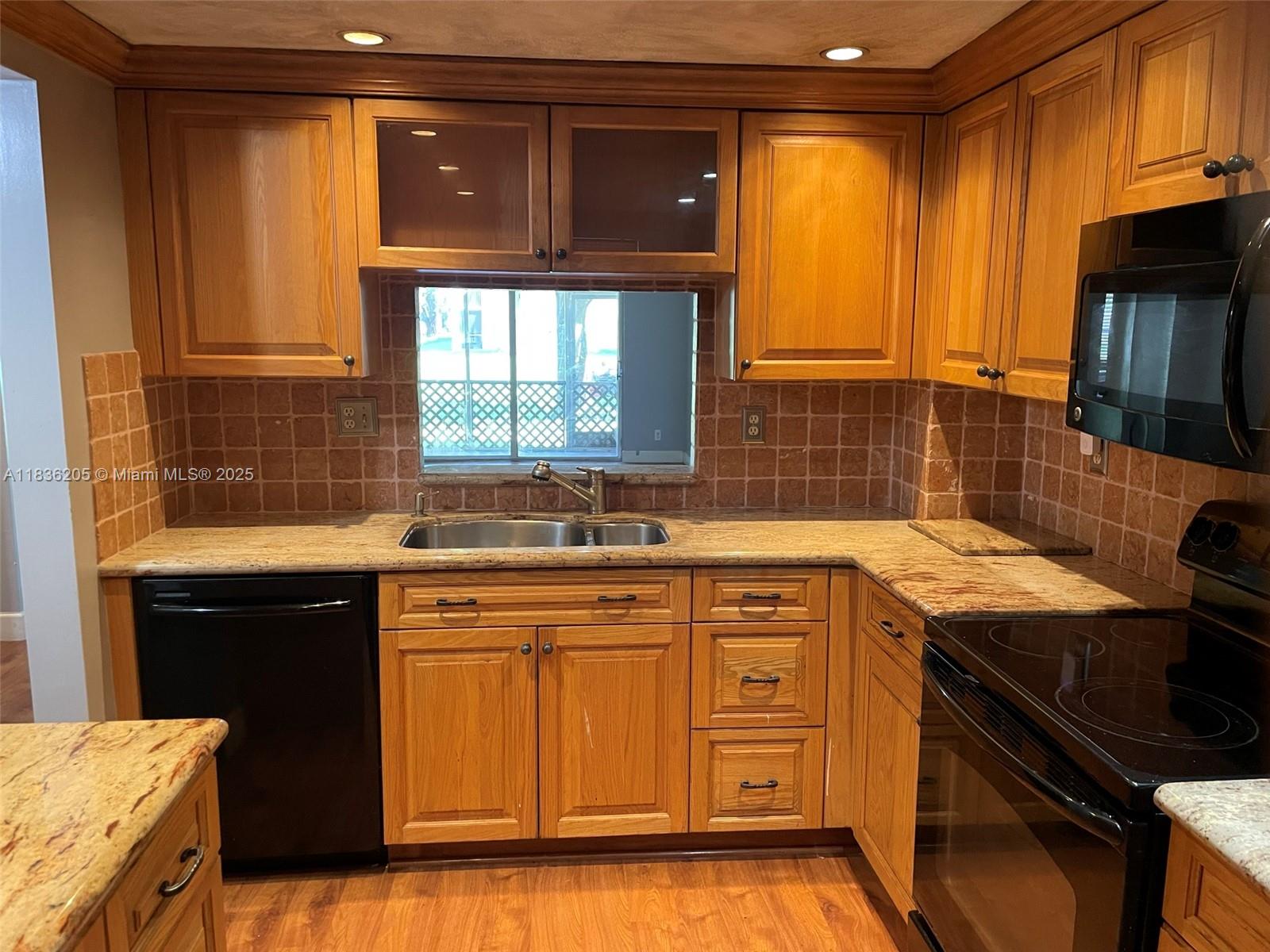 Beautifully remodeled and move-in ready! This spacious first-floor condo features 2 bedrooms and 2 full bathrooms. Enjoy a stylish kitchen with granite countertops, stainless steel appliances, and ample cabinet space. The entire unit is carpeted, providing comfort throughout. Conveniently located in the desirable Sherwood Square community, close to shopping, dining, and major highways. Investor friendly can be rent first year ownership