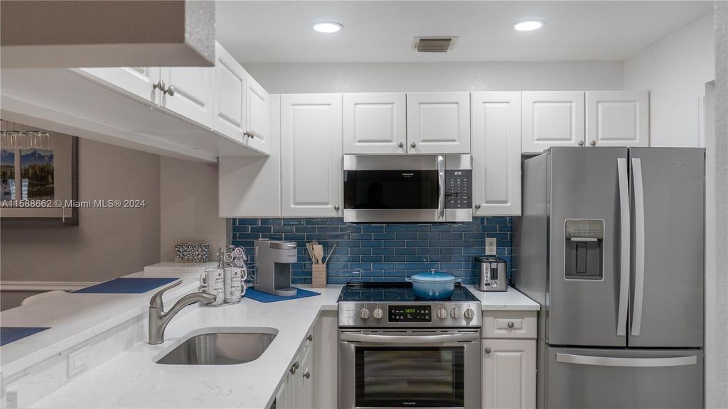 Photo of 2916 Tuscany Ct #201, Palm Beach Gardens, FL 33410 (MLS # A11588662)