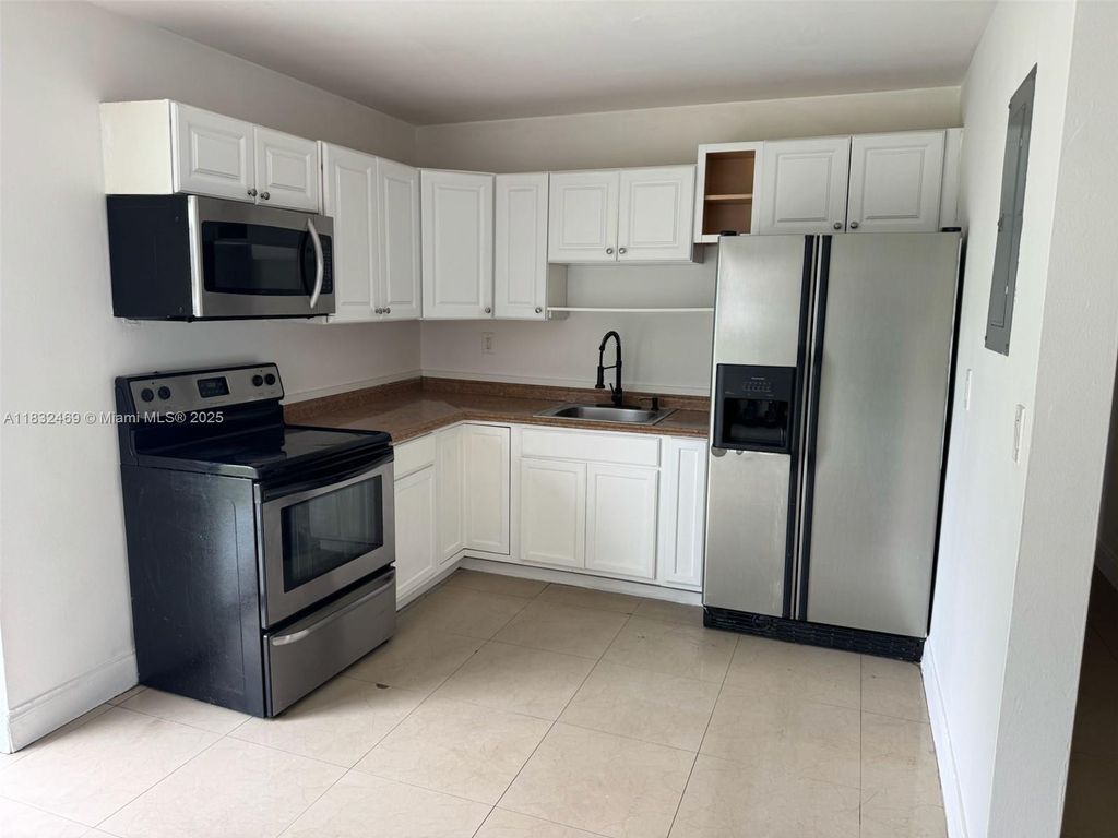 Photo of 1050 NW 23rd Way #0, Fort Lauderdale, FL 33311 (MLS # A11832469)