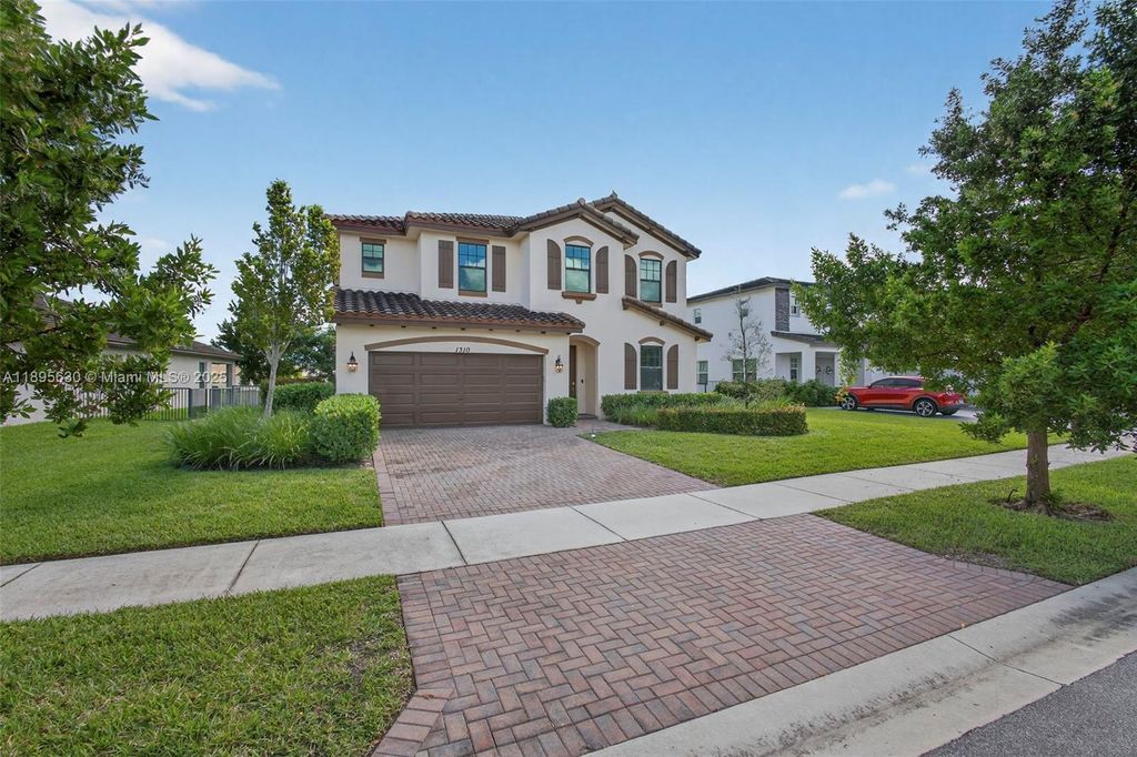 Photo of 1310 Whitcombe Dr, Royal Palm Beach, FL 33411 (MLS # A11895630)