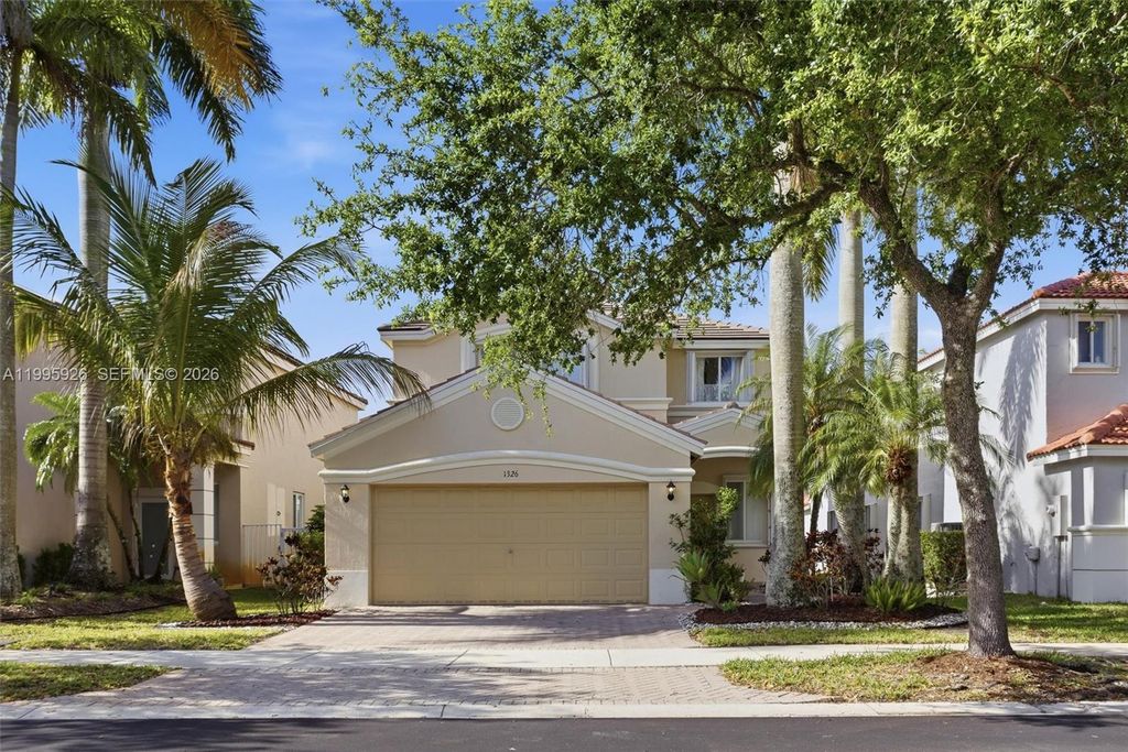 Photo of 1326 Canary Island Dr, Weston, FL 33327 (MLS # A11995926)
