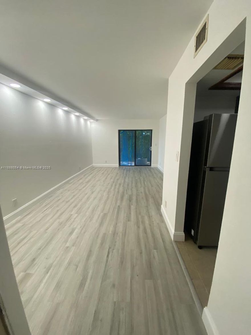 Beautiful, spacious & TOTALLY Remodel Big unit 2 beds/ 1 1/2 baths apartment located in the nice Sunrise Springs community.  Wood cabinetry & stainless steel appliances tile in kitchen and newly installed waterproof laminate flooring throughout. High impact windows, blinds; screened balcony: As.Community features pool & BBQ area. NO PETS as per association.