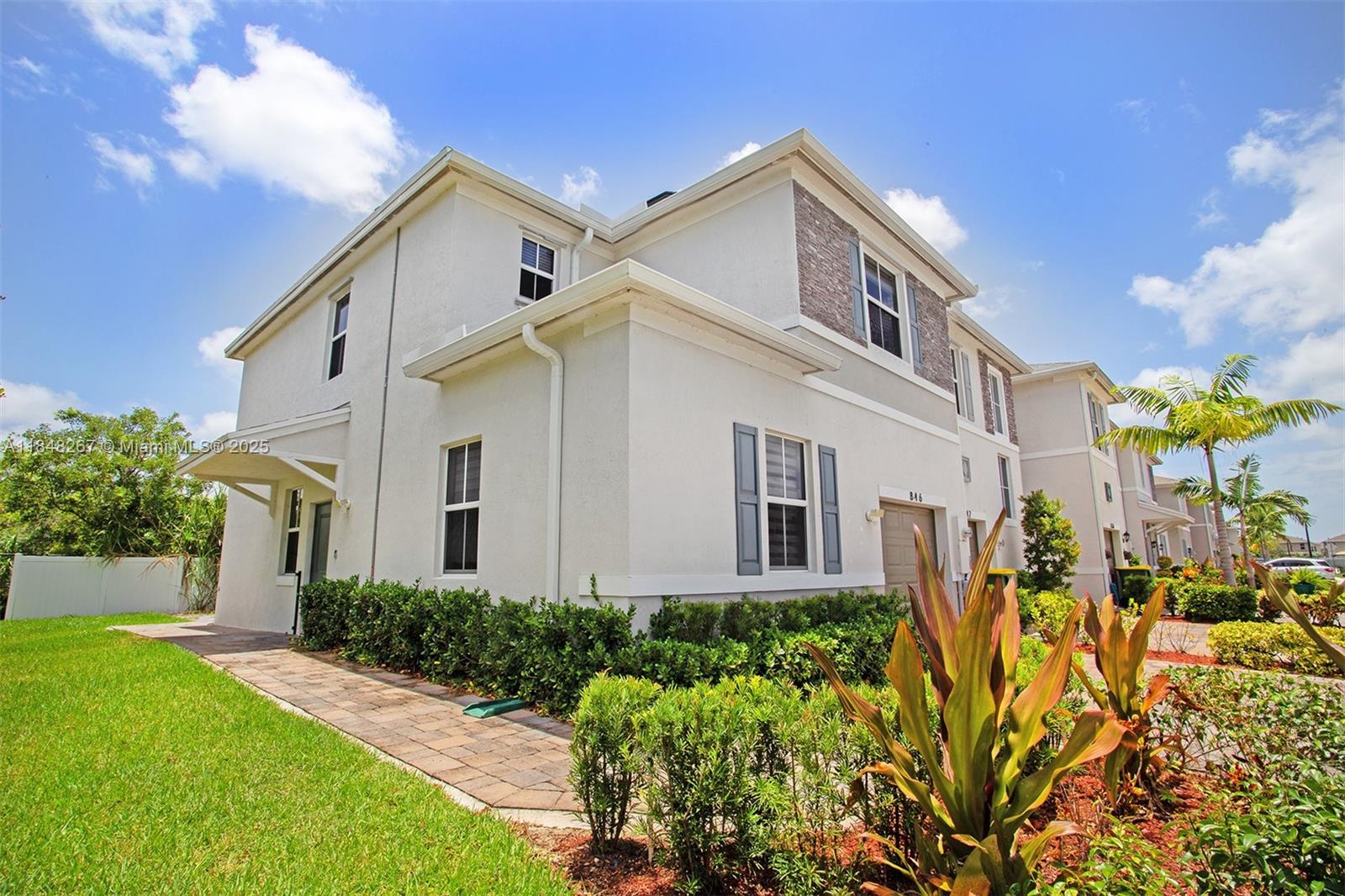 Welcome to the well-maintained community of Marbella! This beautiful 4BR/3BA Corner lot TH, built in 2022, offers the perfect blend of comfort and style. Enjoy the spacious open concept and tons of natural light. This modern kitchen has an island and SS appliances. One bedroom and a full bath are conveniently located downstairs. Upstairs, the primary suite features a custom closet, dual sink, w/shower bath, & a stunning wraparound balcony with peaceful green views. Laundry is upstairs for convenience. The fenced & large patio is perfect for relaxing & entertaining, plus a one-car garage & driveway offer extra parking. The community clubhouse features a large pool overlooking the lake and a fountain. A few mins from Turnpike HWY, Outlets & much more. Just a few miles from the Florida Keys!