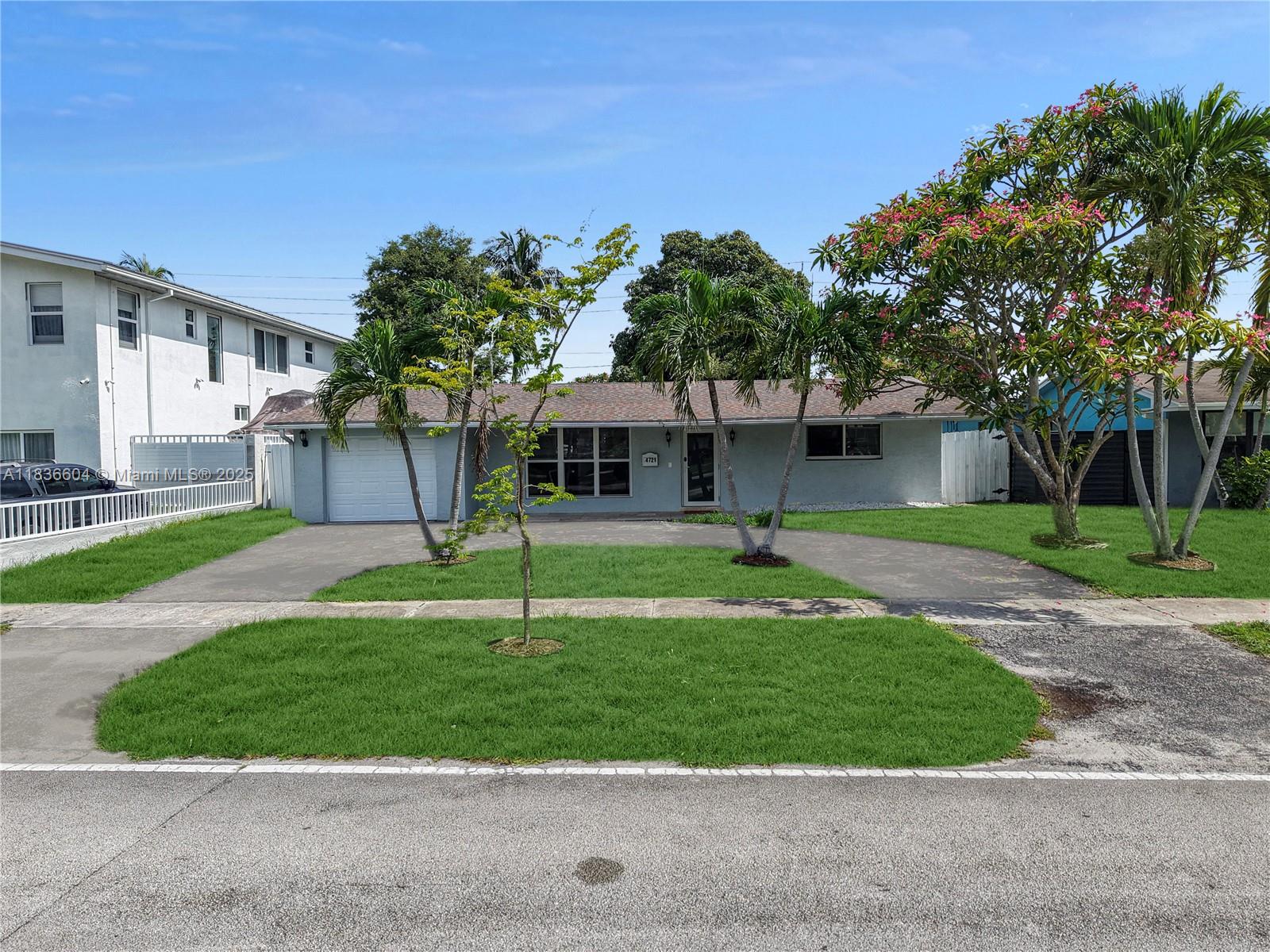 Beautiful 5-bedroom, 4-bathroom home in sought-after Hollywood Hills! This spacious residence features an upgraded kitchen with quartz countertops, stainless steel appliances, and tiled flooring throughout. Enjoy peace of mind with all impact windows and doors, along with stylish, modern bathrooms. The open layout includes a large family room and a generous master suite. Additional highlights include a garage and a private backyard with a mature mango tree and lime tree. Prime location near shopping, beaches, highways, and houses of worship. Buyer to verify all information.