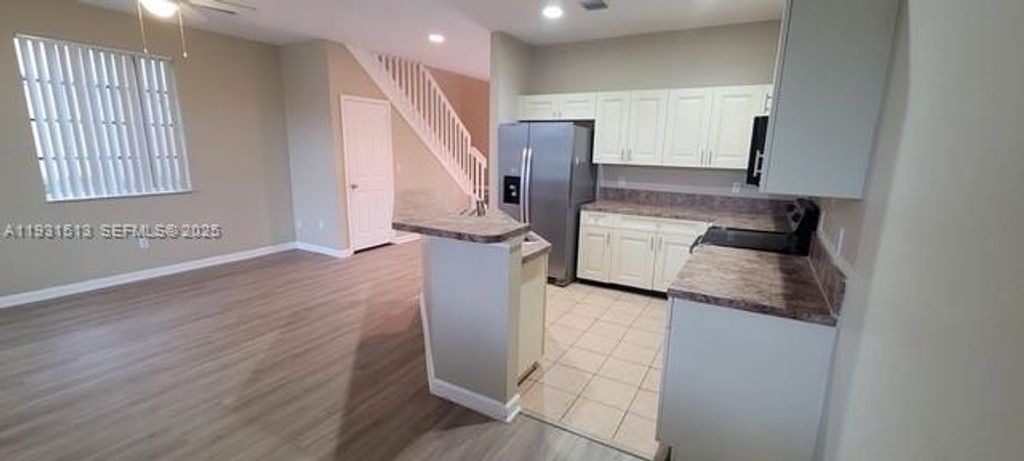 Photo of 1400 LUCAYA Dr, Riviera Beach, FL 33404 (MLS # A11931513)