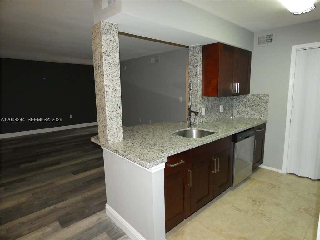 Photo of 2420 NW 33rd St #1004, Oakland Park, FL 33309 (MLS # A12008244)