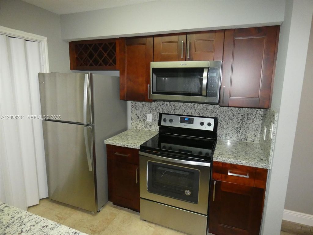 Photo of 2420 NW 33rd St #1004, Oakland Park, FL 33309 (MLS # A12008244)