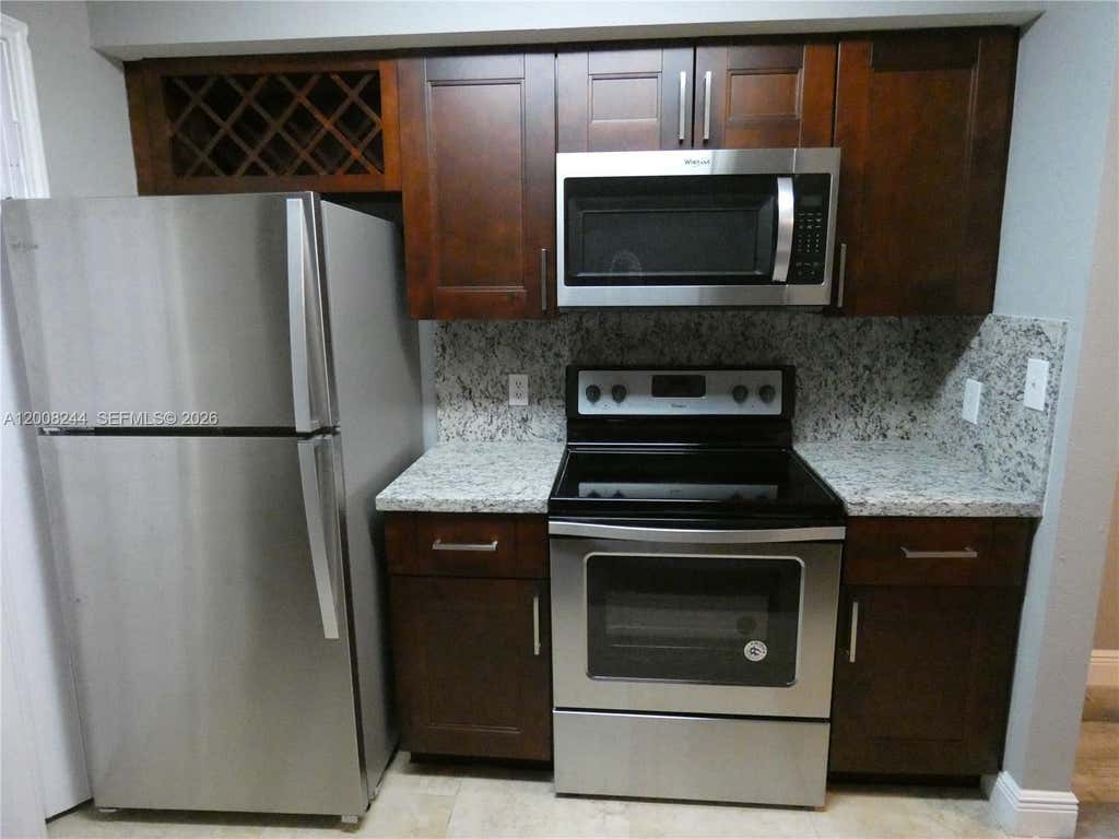 Photo of 2420 NW 33rd St #1004, Oakland Park, FL 33309 (MLS # A12008244)