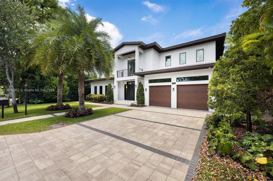 Stunning 6BD/6.5BA contemporary residence in coveted High Pines, offering over 6,400 SF of total area. A dramatic entry opens to soaring ceilings, sleek lines, and expansive impact glass inviting natural light throughout. The chef’s kitchen boasts Sub-Zero, Wolf & Miele appliances and flows seamlessly into open living and dining spaces. Downstairs includes two en-suite bedrooms and formal areas. Upstairs features four additional bedrooms, a loft-style family room, and balconies overlooking lush grounds. Enjoy alfresco living with a covered terrace, summer kitchen, heated saltwater pool & spa. Elevator, smart sound, and security system complete this exceptional home.