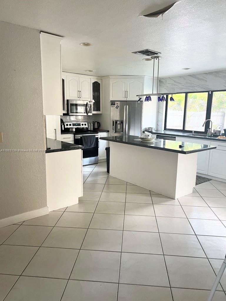 Photo of 7363 NW 49th Ct #7363, Lauderhill, FL 33319 (MLS # A11502139)