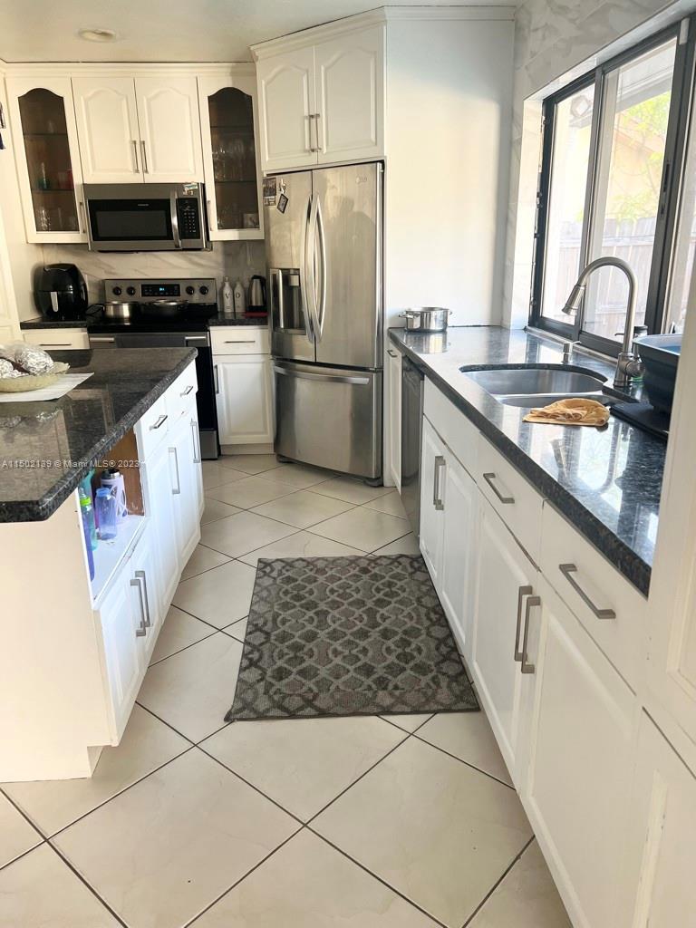 Photo of 7363 NW 49th Ct #7363, Lauderhill, FL 33319 (MLS # A11502139)
