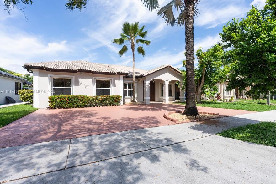 This well-maintained 4 bedroom, 2 bath single family home in the desirable West Miami Lakes area is ready for immediate occupancy. Freshly updated, this home offers a clean and living space with fresh interiors and updated flooring in the bedrooms. The kitchen features modern finishes, and the newer A/C system ensures year-round comfort. The property boasts  a circular driveway for easy parking and a covered patio, perfect for relaxing outdoors. Additional features include an outdoor covered gazebo, a storage shed, and a beautiful backyard with fruit trees, creating a serene and functional outdoor retreat. Located in a quiet area with minimal street traffic, this home is close to Miami Lakes Park and offers convenient access to local amenities. Renters insurance is required.