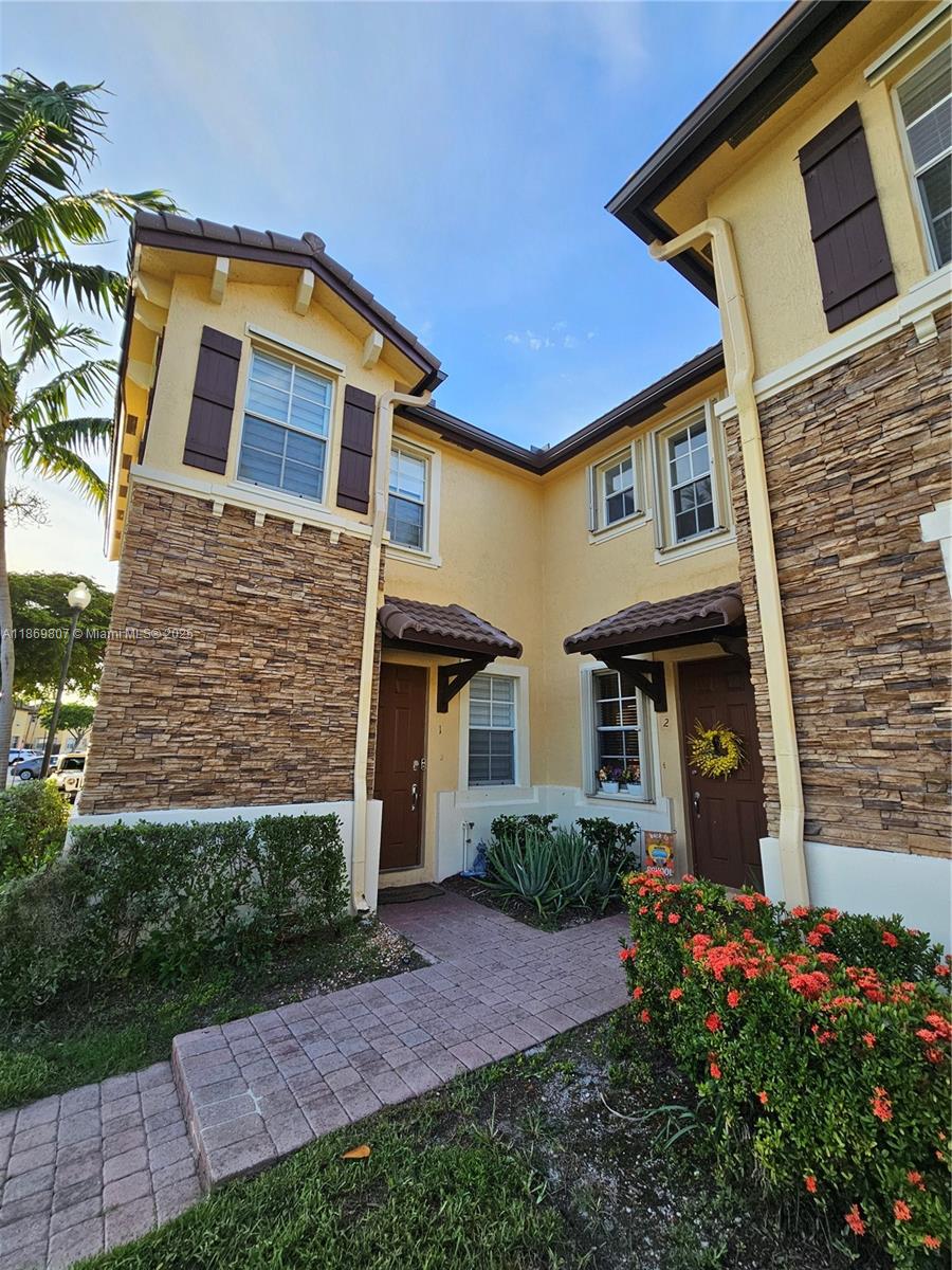 **Step into modern living!** This stunning gated community townhome shines with brand-new stainless steel Samsung appliances, a fully renovated downstairs bath, and a newly installed roof. Offering 1 bedroom downstairs and 3 upstairs plus 2 additional full baths, there’s room for everyone. Relax on your newly fenced, paved patio or enjoy resort-style amenities including a sparkling pool, fitness center, clubhouse, and kids’ playground. Assigned parking plus abundant guest spaces make life effortless. Move-in ready comfort and style all in one!