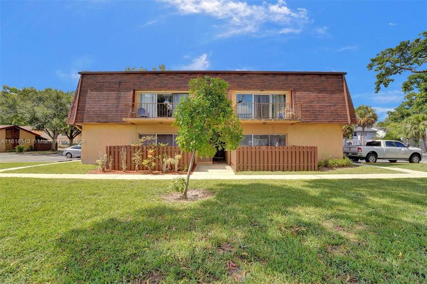 Welcome to your new home in the vibrant Apple Creek community! This charming 2-bed, 1-bath condo boasts 969 sq ft of bright, airy living space. Nestled on the second floor, it features a spacious balcony overlooking lush greenery, perfect for morning coffee or evening relaxation. Inside, discover a well-designed layout with a large master bedroom and a generous walk-in closet leading to the bathroom. The modern kitchen is equipped with LG appliances, a convenient washer/dryer, and a ceiling fan to keep things cool while you cook. Located minutes from schools, shopping, and the Florida Turnpike, making commutes a breeze. Ideal for first-time buyers or investors, this condo offers a unique opportunity to own a piece of Plantation's charm.