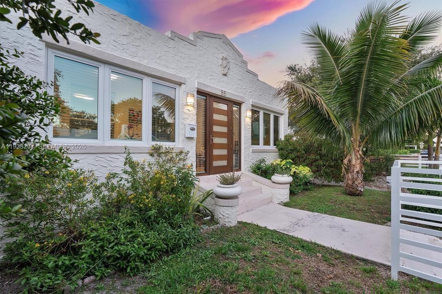 Impeccably updated Spanish Mission home in the heart of Buena Vista, thoughtfully blending timeless architectural character with today’s modern conveniences. Filled with natural light, the home feels bright, airy, and lives larger than its square footage suggests. A gracious entry foyer welcomes you and overlooks a charming butterfly garden, setting the tone for the indoor–outdoor lifestyle. The open living and dining areas feature a working fireplace, beautifully preserved Dade County pine floors, and an easy, inviting flow ideal for both everyday living and entertaining. Bathrooms have been tastefully updated with classic finishes that respect the home’s original charm, while the brand-new kitchen is a standout, finished with quartz countertops, stainless steel appliances, ample storage, and a dedicated laundry area. The kitchen opens seamlessly to a stunning tropical backyard, where abundant pollinator & fruit plants create a lush, private oasis—perfect for gatherings, al fresco dining, or peaceful moments of zen. A detached garage has been thoughtfully converted into flexible space with HVAC & plumbing, ideal for a home office, studio, or guest retreat. Extensive updates include impact windows/doors, updated plumbing/electrical, solar panels & more. Ideally located within walking distance to the Design District, Midtown and upper Buena Vista and just minutes to downtown, Wynwood & Miami Beach, this home offers the perfect balance of character, comfort & location.