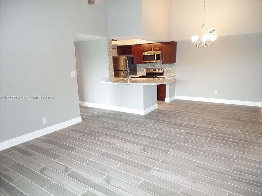 Renovated 2BR/2BA top-floor unit with vaulted ceilings in gated Sun Vista Gardens. 
Features porcelain plank tile throughout, full-size in-unit washer/dryer, spacious walk-in closets, and relaxing screened patio. 
Community amenities include resort-style pool, Jacuzzi, fitness center, tennis courts, and gated security. 
Prime Tamarac location near Rock Island & Commercial Blvd, Florida Turnpike, local colleges, parks, and shopping. 
Pet-friendly , all sizes and breeds welcome. 
Water & trash included.