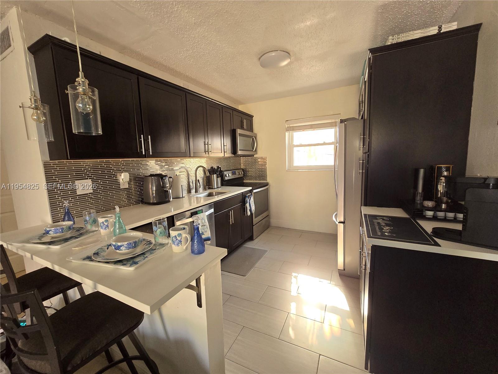 EL SOL AT MAIN STREET CON - Residential