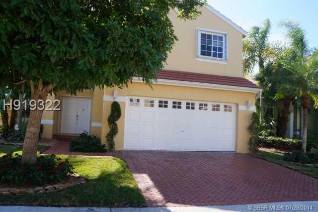 Absolutely stunning.Trendy & Ultra-Modern Smart Kitchen with the hottest ss appliances,LuxuryGranite Countertop & marble backsplash with Dark wood cherry Cabinets. All Impact hurricane windows and accordion shutters.Approx 250 sq ft more to the living and family with permits.New Digital A/C. Elegant Master Bath & Spa with Italian Marble,Glass shower& Hydro massage shower system. Security Camera System.TV,Cable,Sound&Computer wall Panel.French doors,Electric HunterDouglas shades,Custom made closets & more
