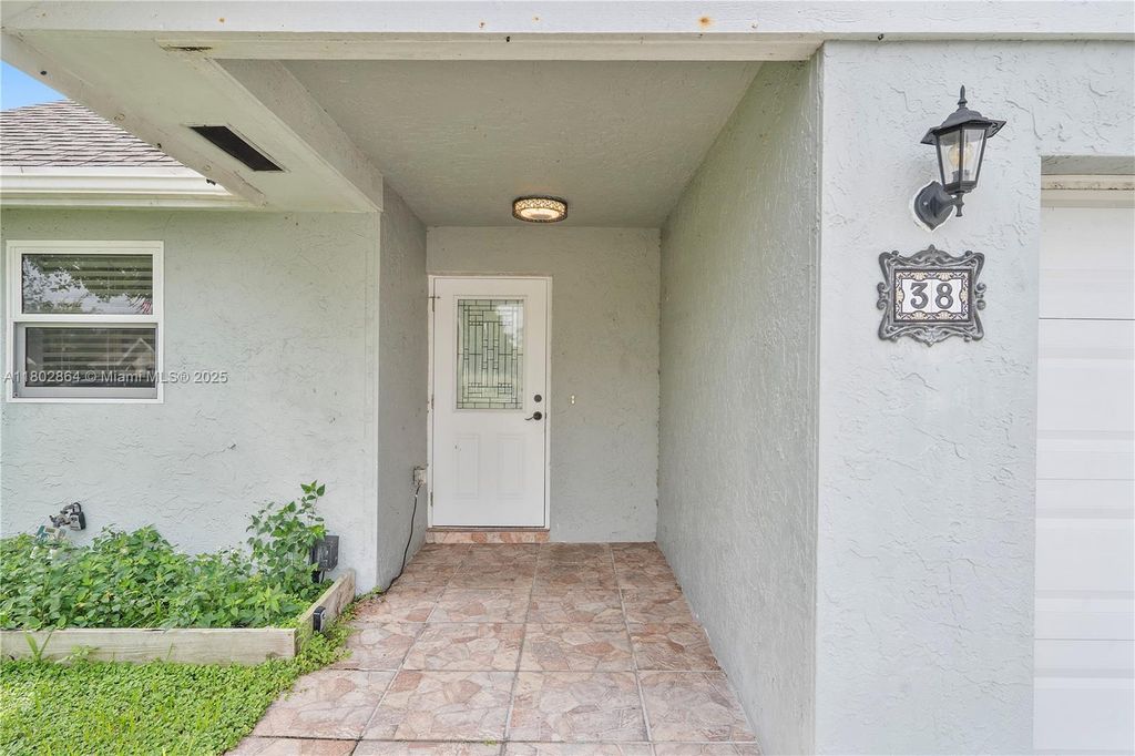 Photo of 38 E Tara Lakes Dr E #1, Boynton Beach, FL 33436 (MLS # A11802864)