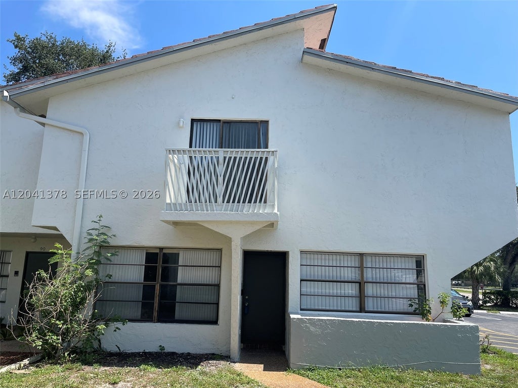 Photo of 2580 Coral Springs Dr #2580, Coral Springs, FL 33065 (MLS # A12041378)