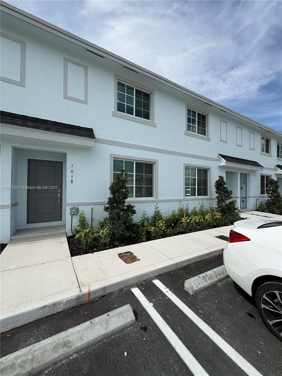 New construction townhome for rent. Move into this stunning 3-bedrrom, 3-full bathrooms home designed with comfort and style in mind. With a bedroom on the first and spacious living areas, this layout is ideal for families or roommates who need flexibility and privacy. Bright open concept floor plan with tile throughout the main level and carpet upstairs, sleek kitchen with stainless steel appliances and granite countertops. Large master suite with walk-in closet and private en suite bathroom. Convenient in-unit washer and dryer. Excellent location just minutes from the Turnpike, making commuting to Miami and beyond a breeze. First month and security with good credit. Call today to schedule your tour!