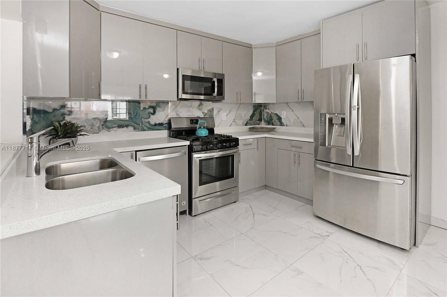 Charming and versatile 3-bedroom, 2-bath home on a flexible layout with guest quarters or easy single-family use. Additional den for work or relaxation. New roof and A/C. Beautifully updated kitchen with quartz countertops, grey cabinetry, stainless steel appliances, and gas stove. Porcelain tile throughout, with wood-look porcelain in the living areas. Bathrooms finished with porcelain walls and walk-in shower. Alley-access parking for four cars, two-car carport, circular driveway, and fenced backyard with space for a pool. Well-maintained property offering style, comfort, and potential.