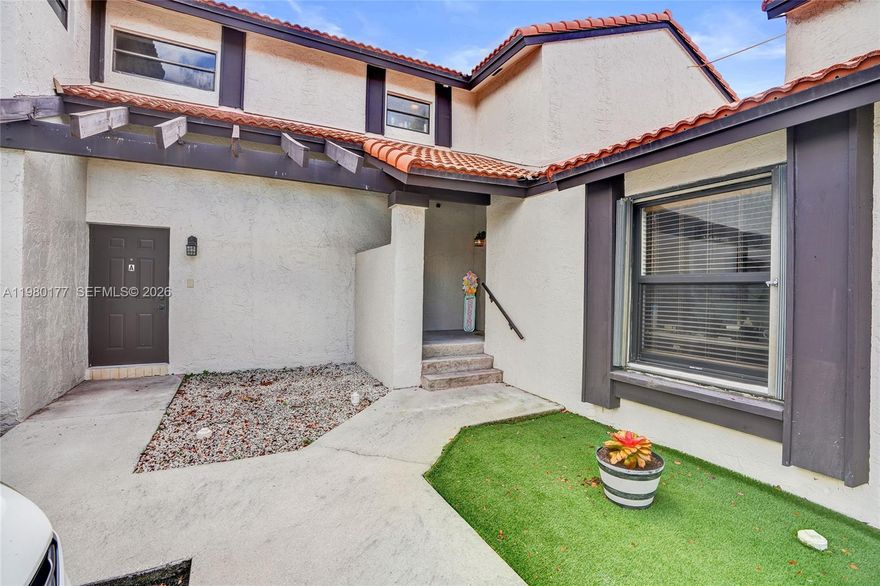 Welcome to this charming 2-bedroom, 1.5-bathroom two-story townhouse in the highly sought-after Lakes of the Meadow community in West Kendall. The showpiece of this home is the stunning fully renovated
  kitchen featuring white shaker cabinetry, quartz countertops, a geometric tile backsplash, stainless steel appliances, modern light fixtures, and a breakfast bar perfect for entertaining. The open-concept
  first floor offers a spacious living room with soaring ceilings and a generous dining area that flows seamlessly into the kitchen. Sliding glass doors lead to a private fenced backyard with a patio and turf,
   ideal for grilling, relaxing, or outdoor play. A convenient half bath completes the first floor. Upstairs, two well-sized bedrooms feature plush carpeting and abundant natural light. The primary bedroom
  boasts a walk-in closet and a private balcony with community views. Both bedrooms share a full bathroom with ample vanity space. Lakes of the Meadow is one of West Kendall's most desirable communities,
  offering resort-style amenities including a swimming pool, fitness center, clubhouse, tennis, racquetball, basketball, and pickleball courts, children's playgrounds, jogging paths, and scenic lakes, all with
   24-hour security patrol. Conveniently located near top-rated schools including Jane S. Roberts K-8, major highways, shopping centers, and restaurants. Pet-friendly community. Don't miss this opportunity!