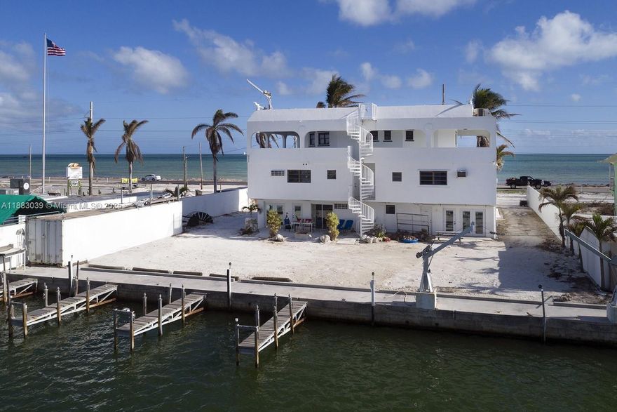 Investor or Developer Opportunity in the Heart of Islamorada!
This waterfront property features 8 income-producing units in excellent condition, including seven 1-bedroom/1-bath units and one penthouse 3-bedroom/2-bath unit.
All units are currently leased, offering immediate cash flow. Enjoy ample parking, a premium location directly on Overseas Highway, and frontage to the water — a rare find in such a central area.
Zoning allows for multiple possibilities. Whether you're looking to expand, redevelop, or simply enjoy stable income, this property is a must-see in the Florida Keys.
Walking distance to restaurants, shops, marinas, and more.