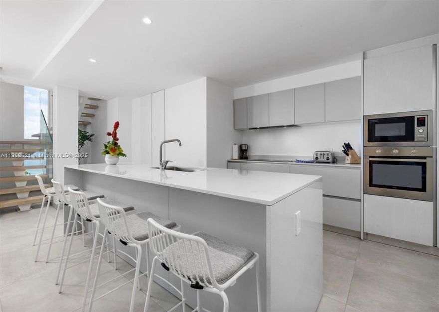 Aruba's Luxury  living blending modern design with island elegance — perfect for a full-time residence, vacation retreat, or investment property. Situated on world-renowned Eagle Beach. 
Condition: Brand new / never lived in 3rd floor (exclusive views of Eagle Beach & Caribbean Sea) Open-concept living and dining area. Floor-to-ceiling glass doors with natural light and ocean views
Private balcony with space for dining and lounging italian-designed kitchen with quartz countertops and custom cabinetry. High-end stainless steel appliances
Spacious master suite , and spa-style ensuite (rain shower) Two guest bedrooms with queen beds and private baths (rain showers)  In-unit utility room with washer & drye