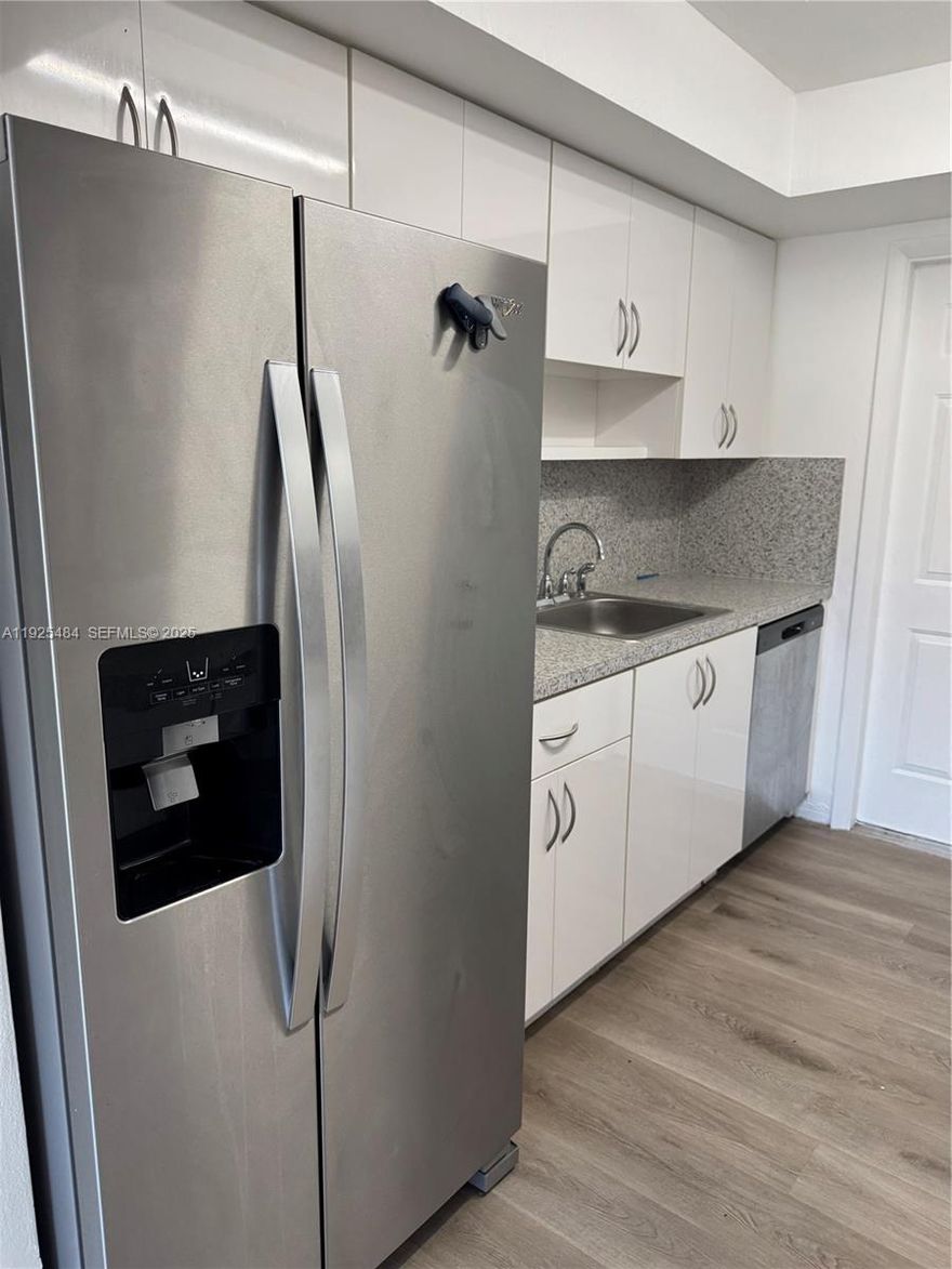 Renovated 2-bedroom, 2-full-bath unit in a duplex featuring stainless steel appliances, updated finishes, and bright, spacious rooms. Comfortable layout, modern feel, and located in a nice, convenient area close to shops, restaurants, and major routes. Easy to show.