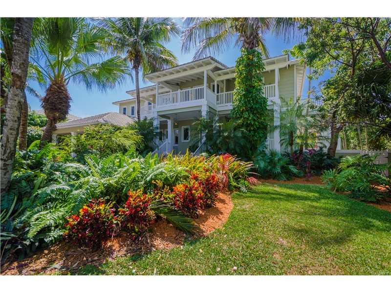 Key West plantation-style in Key Biscayne. Exquisite & flawless detailed finishes featuring superior millwork, Stone & hardwood floors and spacious high ceilings. Great floor plan. Oversized family room opens to chef's dream kitchen and breakfast area. Sp acious master suite w/office area and spa-like bathroom. All bedrooms in suite. Oversized wrap around porches. Inviting large open pool, a dreamed house in 10,000 sq.feet of beautifully landscaped lot.