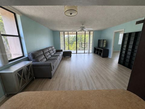 Photo of 6800 Cypress Rd #415, Plantation, FL 33317 (MLS # A12015880)