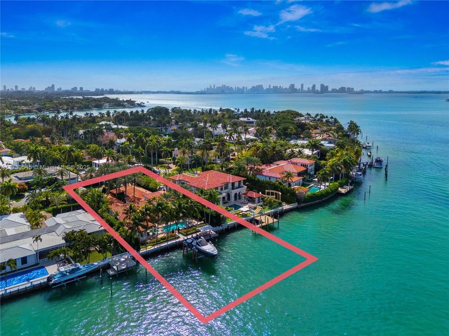 PALM BEACH WATERFRONT ELEGANCE ON LA GORCE ISLAND! Timeless & Sophisticated Walled & Gated Mediterranean Estate in Lush Palm Tree-Lined Gardens. 5 Beds + Service + 6.5 Baths w/Cabana Bath. 6,116 Adj Gross SF on Oversized 19,132 SF Lot with 104 FT of Waterfrontage. Spacious Living Area with 20FT Ceilings. Radius Windows w/Panoramic Direct Bay Views. Courtyard w/Wood-Vaulted Pathways + Keystone Fountain in Heart of the Home leading to Guest Suites. Kitchen w/Oversized Carrara Marble Island & Viking Gas Range + Miele Appliances + Wine Fridge. Massive Heated Pool + Spa in Keystone w/Submerged Dining Table for you to Sit & Dine while stay cool. Gazebo w/Summer Kitchen. 2-Car Garage. NEW Boat Lift + Dock. La Gorce Island is a Pristine Gated Community w/ 24/7 Security & only 33 Waterfront Homes.