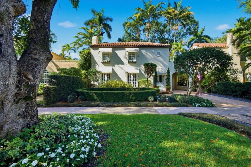 Step into one of Coral Gables’ most coveted historic treasures located in the Golden Triangle – a breathtaking 1928 Old Spanish Classic masterfully reimagined as a romantic Mediterranean Masterpiece, where timeless architecture meets luxurious modern living. This designated historic landmark, set on a beautifully landscaped lot just steps from the iconic Biltmore Hotel and Salvadore Park, features formal living and dining rooms displaying oak floors with walnut inlaid. Airy eat-in kitchen leading to private courtyard with spa-pool, logia, and guest/family quarters. The spectacular constructed guest house features a designer bath and a 2-car garage with custom wood doors decorated with ironwork. Enjoy the professionally landscaped formal and tropical gardens featuring Old Chicago brick driveway and shell stone patio – all combining to create an extraordinary residence where no detail was overlooked and no expense was spared.