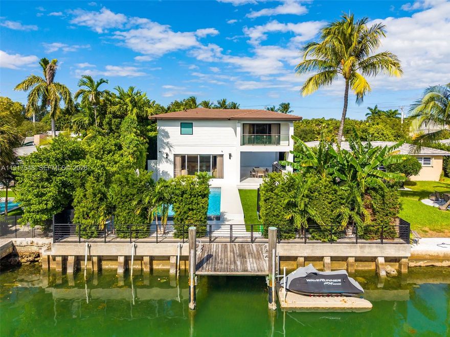 Step into waterfront luxury at 710 S Shore Drive— a fully reimagined 5BD/5.5BA modern home with 4,295 SF on a 10,200 SF lot and 60 ft of water frontage. Also offered at $11.270M with 700 S Shore next door, combining for 120 ft on the water and 21,000+ SF of land one of Normandy Island’s largest opportunities. Features include a custom kitchen, spacious living room, luxe primary suite with wet bar, dual walk-ins, wine room, and an 800 SF garage with bath and storage. Upgrades include new ACs, custom doors, redesigned stairs, lush landscaping, fishpond, artificial turf, and a resort-style pool. Turn-key, private, and elevated waterfront living.
