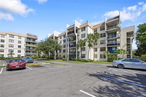 Photo of 6190 Woodlands Blvd #302, Tamarac, FL 33319 (MLS # A11914111)