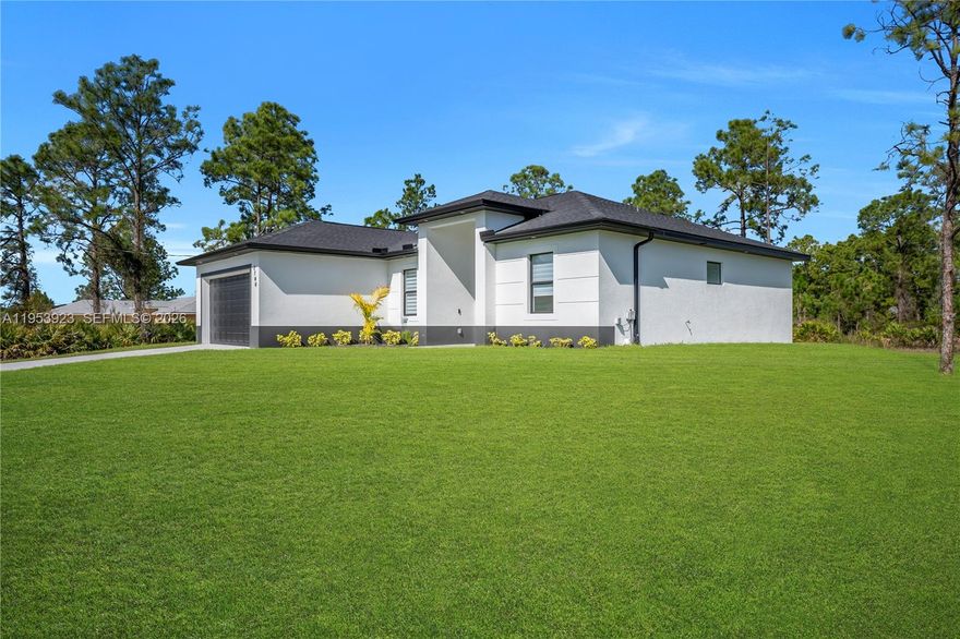 Welcome to this brand-new home located on a corner lot in Lehigh Acres. This well-designed residence offers 3 bedrooms plus a den, 2 full bathrooms, and a 2-car garage with epoxy floor, combining comfort, functionality, and modern style.
Step inside to an open-concept layout featuring 10-foot ceilings and porcelain tile flooring throughout. Built with impact-resistant windows and doors, the home offers added peace of mind.
The modern kitchen features quartz countertops, refined cabinetry, and Samsung stainless steel appliances in the kitchen. The home also includes washer and dryer. The primary suite offers two walk-in closets and an ensuite bath with dual sinks.
 Conveniently located near major roads, shopping, and schools. Move-in ready and a great opportunity in one of Southwest Florida’s fastest-growing areas.