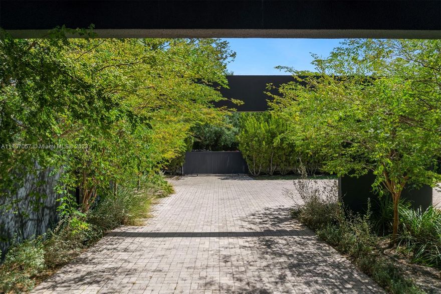 This exceptional 7,838 Sq. Ft. residence with 6 bedrooms and 6.5 baths merges modern and contemporary architecture, featuring a seamless floor plan with walls of sliding glass doors that offer stunning views of manicured landscaping, a resort-style pool and basketball/tennis court. Spacious, beautiful living areas are the centerpiece of this home, integrating a state-of-the-art kitchen with the dining and family areas, creating a blend of ambience and luxury living. The stylish main suite has large walk-in closet and spa-like bath. Built with incredible attention to detail, the home has epoxy cement and wood floors, modern swinging and black mirrored doors and solar roof tiles. The 3-car garage, vast driveway, laundry room and incredible location complete this one-of-a-kind masterpiece.