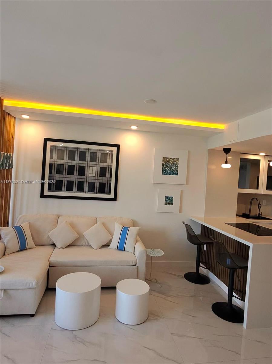 Beautiful, completely remodeled studio available. Move in ready. 24h Concierge. 2 parking spaces available. Solid building with reserve. Beach access. Building has completed its 50 year certification. HOA fees includes internet, beach service, internet, gym and more. Easy to show. Text agent for more information