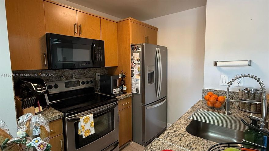 HAS RESERVES!!! Beautifully updated 2/2 condo in the heart of Kendall! Located on the 2nd floor, this unit features new flooring, a modern kitchen with quartz-style countertops, refreshed bathrooms, and in-unit washer/dryer. Enjoy a private balcony and tons of natural light. The building has been recently renovated with a new roof, exterior paint, updated hallways, and a revitalized pool. Additional perks include elevator access, trash chute, private storage, assigned parking, and guest parking. Just minutes from Baptist Hospital, FIU, Turnpike, major stores, and top-rated schools. Move-in ready and packed with value—schedule your tour today!